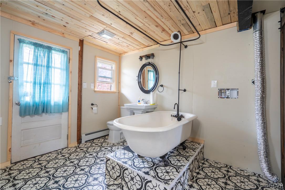 1234 Sunset Circle Slatington, PA 18080 - Photo 17 of 40 a bathroom with a sink and a mirror