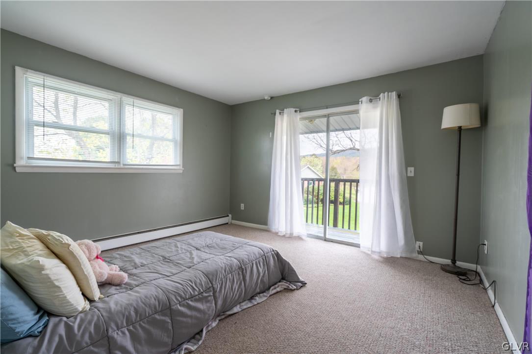 1234 Sunset Circle Slatington, PA 18080 - Photo 22 of 40 a bedroom with a bed and a window