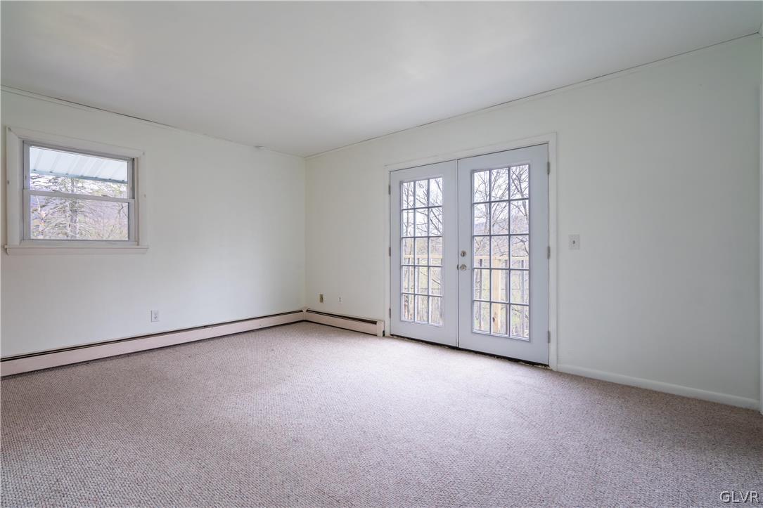 1234 Sunset Circle Slatington, PA 18080 - Photo 26 of 40 an empty room with a empty space and windows
