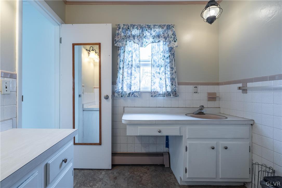 1234 Sunset Circle Slatington, PA 18080 - Photo 31 of 40 a bathroom with a sink and a mirror