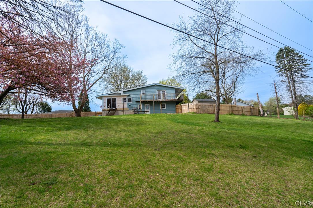 1234 Sunset Circle Slatington, PA 18080 - Photo 35 of 40 a view of a house next to a big yard with large trees
