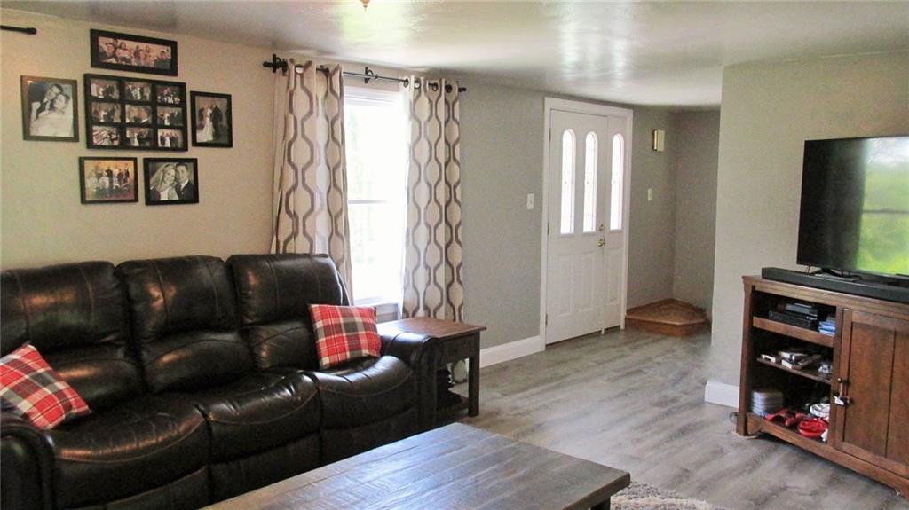 236 Freeman Road Irwin, PA 15642 - Photo 5 of 24 Open floor plan with neutral decor and gorgeous vinyl plank flooring!