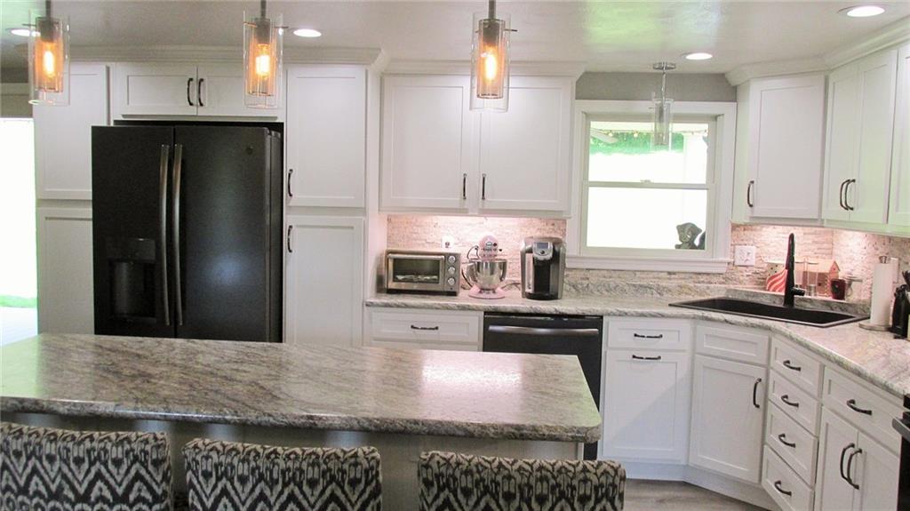 236 Freeman Road Irwin, PA 15642 - Photo 7 of 24 Fabulous cabinets with easy close drawers...matching island has electricity and can easily sit four!
