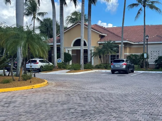 a front view of a house with swimming pool