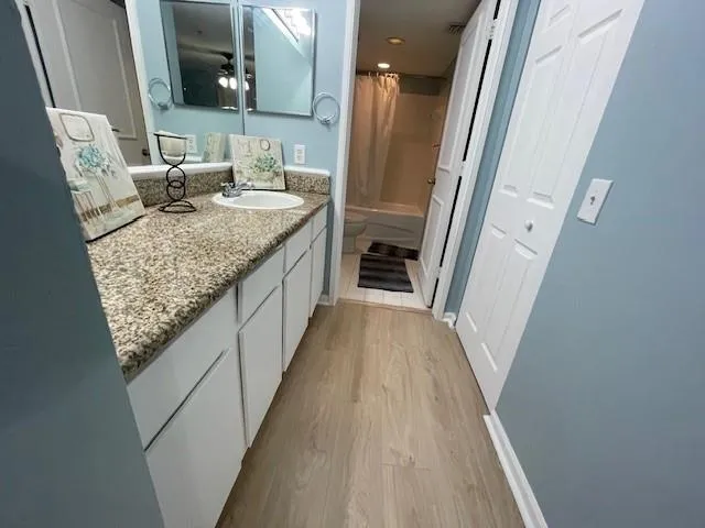 a bathroom with sink and mirror
