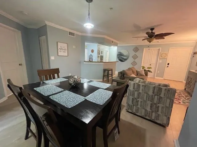 a view of a dining room with furniture