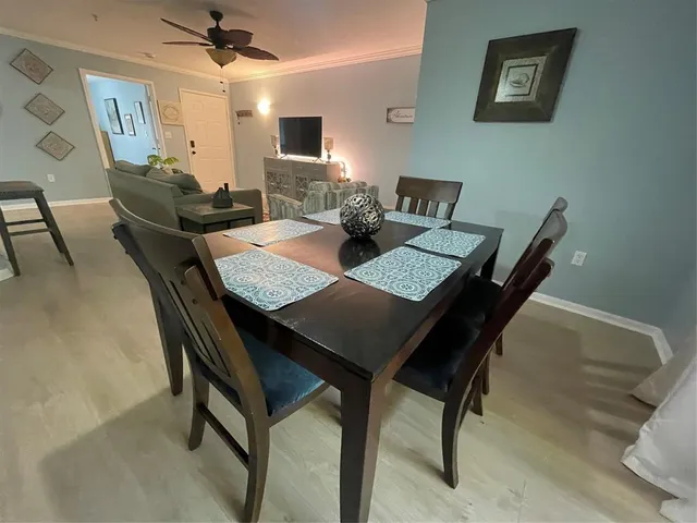 a view of a dining room with furniture