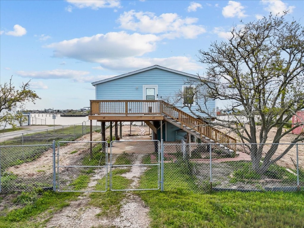 1048 16th Street Dickinson, TX 77539 - Photo 4 of 28 a view of a house with a yard
