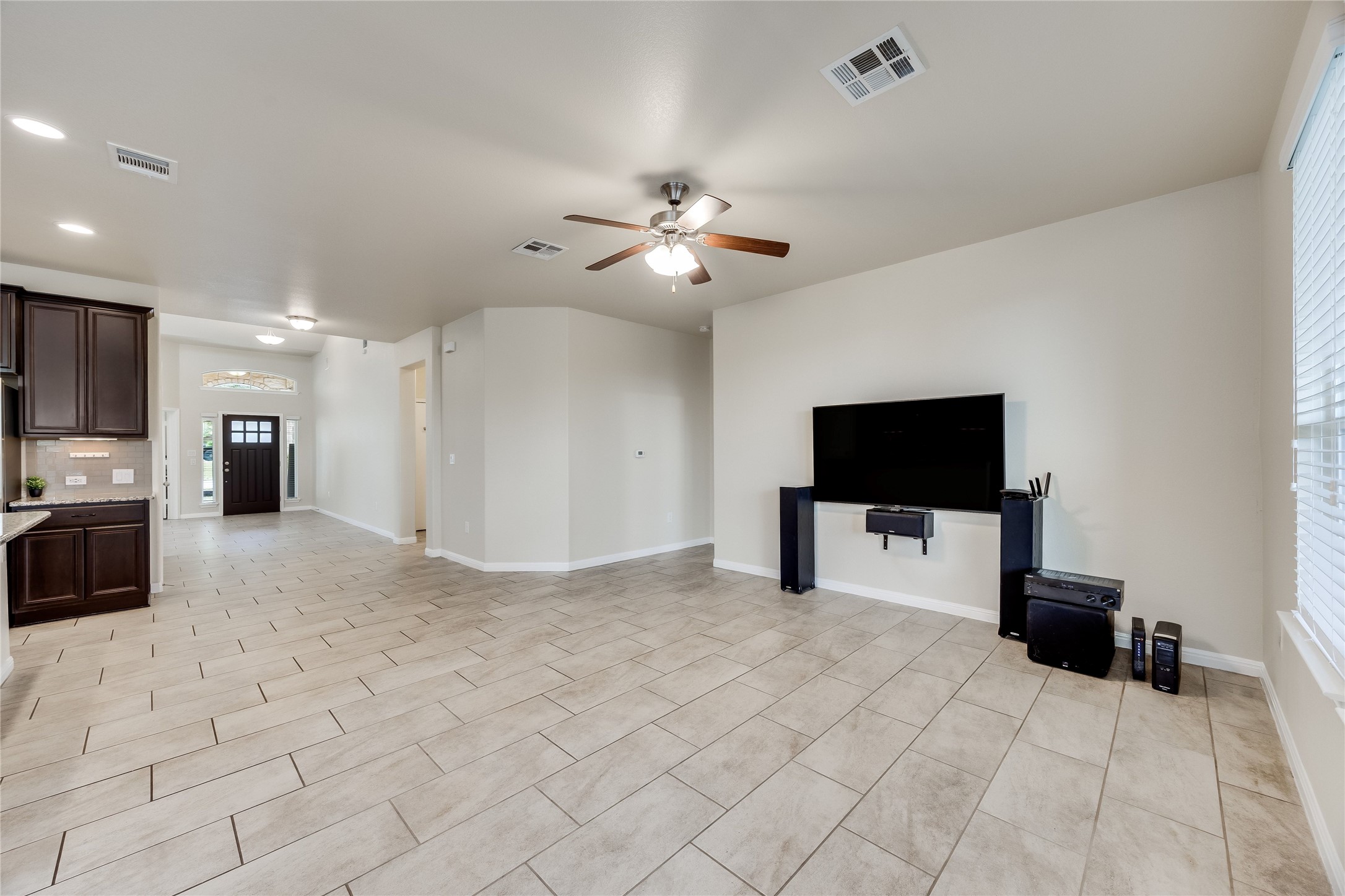 11328 Reading Way Austin, TX 78717 - Photo 6 of 37 a living room with furniture and a flat screen tv