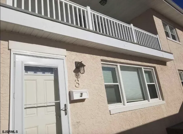 a view of a house with a balcony