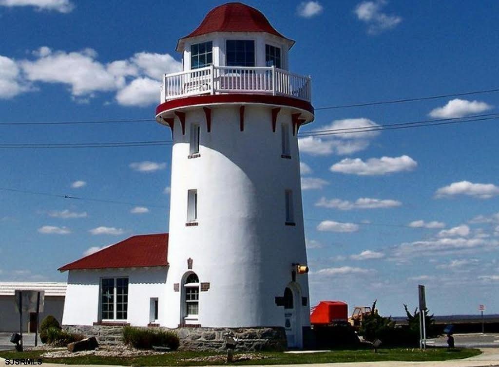 4313 West Brigantine Avenue, Unit 3 Brigantine, NJ 08203 - Photo 15 of 15 a front view of a house with a yard