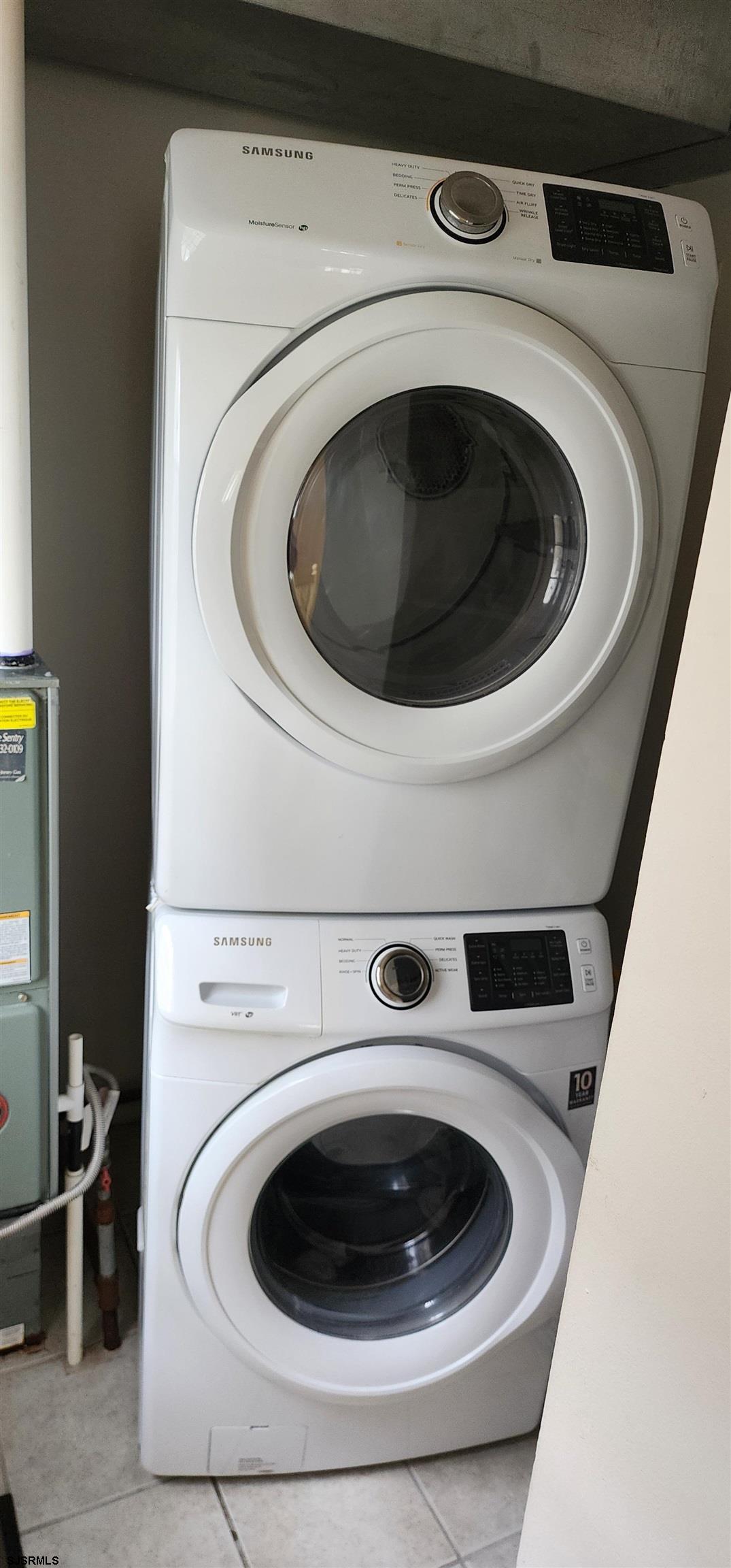 4313 West Brigantine Avenue, Unit 3 Brigantine, NJ 08203 - Photo 6 of 15 a utility room with dryer and washer