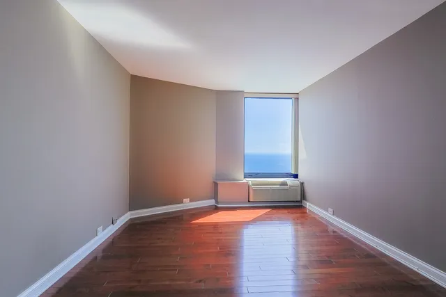 a view of a livingroom with wooden floor