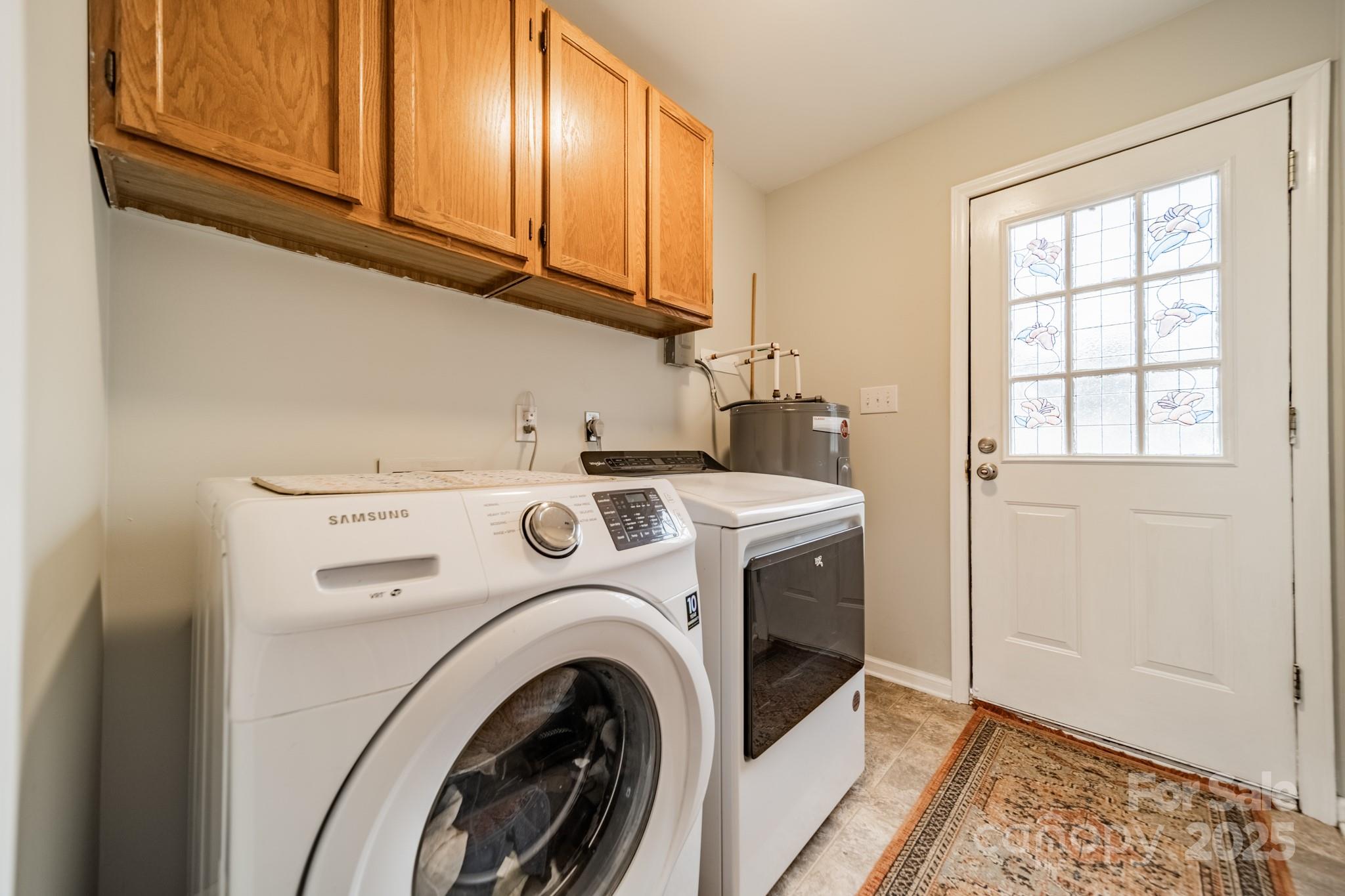 3414 Clearview Drive Monroe, NC 28110 - Photo 13 of 13 a utility room with dryer and washer