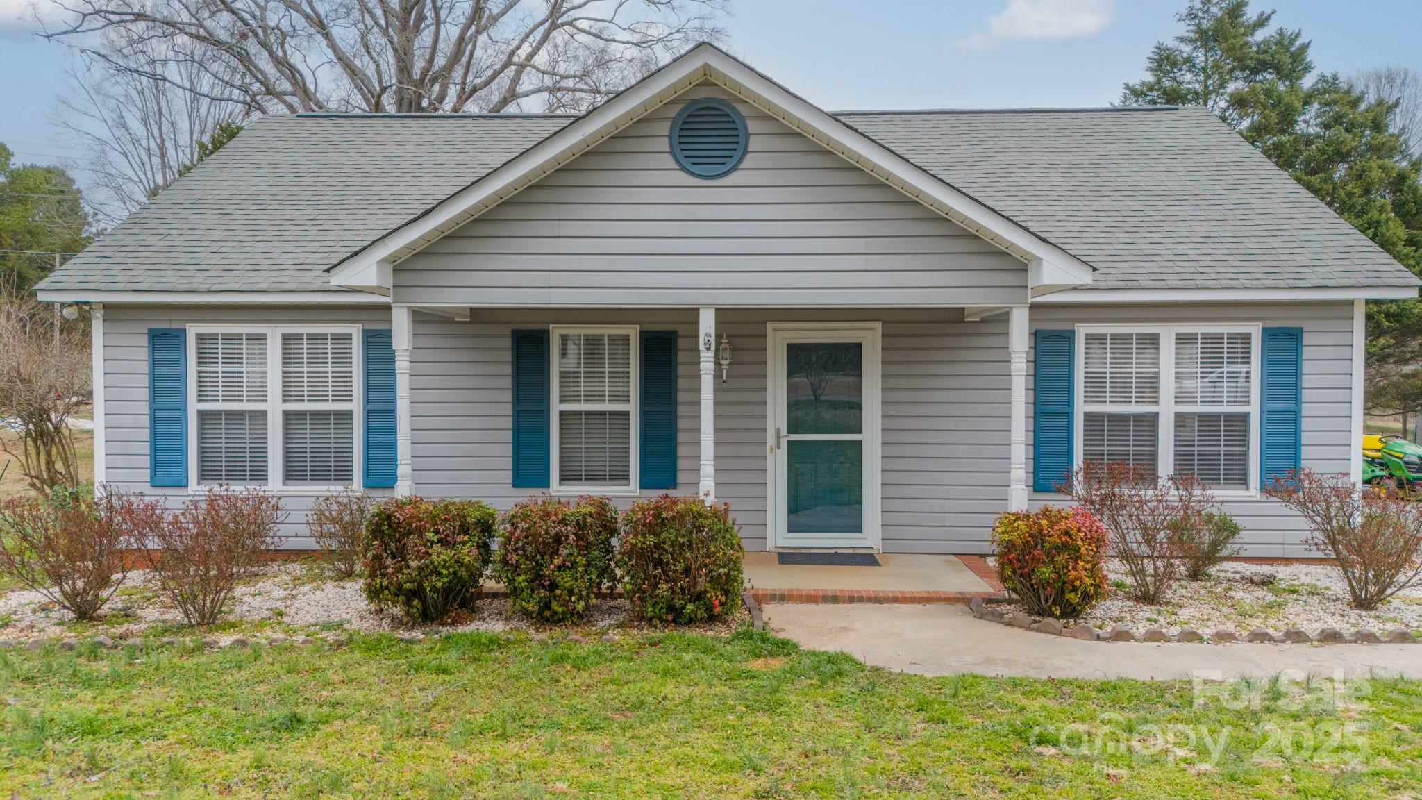 3414 Clearview Drive Monroe, NC 28110 - Photo 2 of 13 a front view of a house with a yard