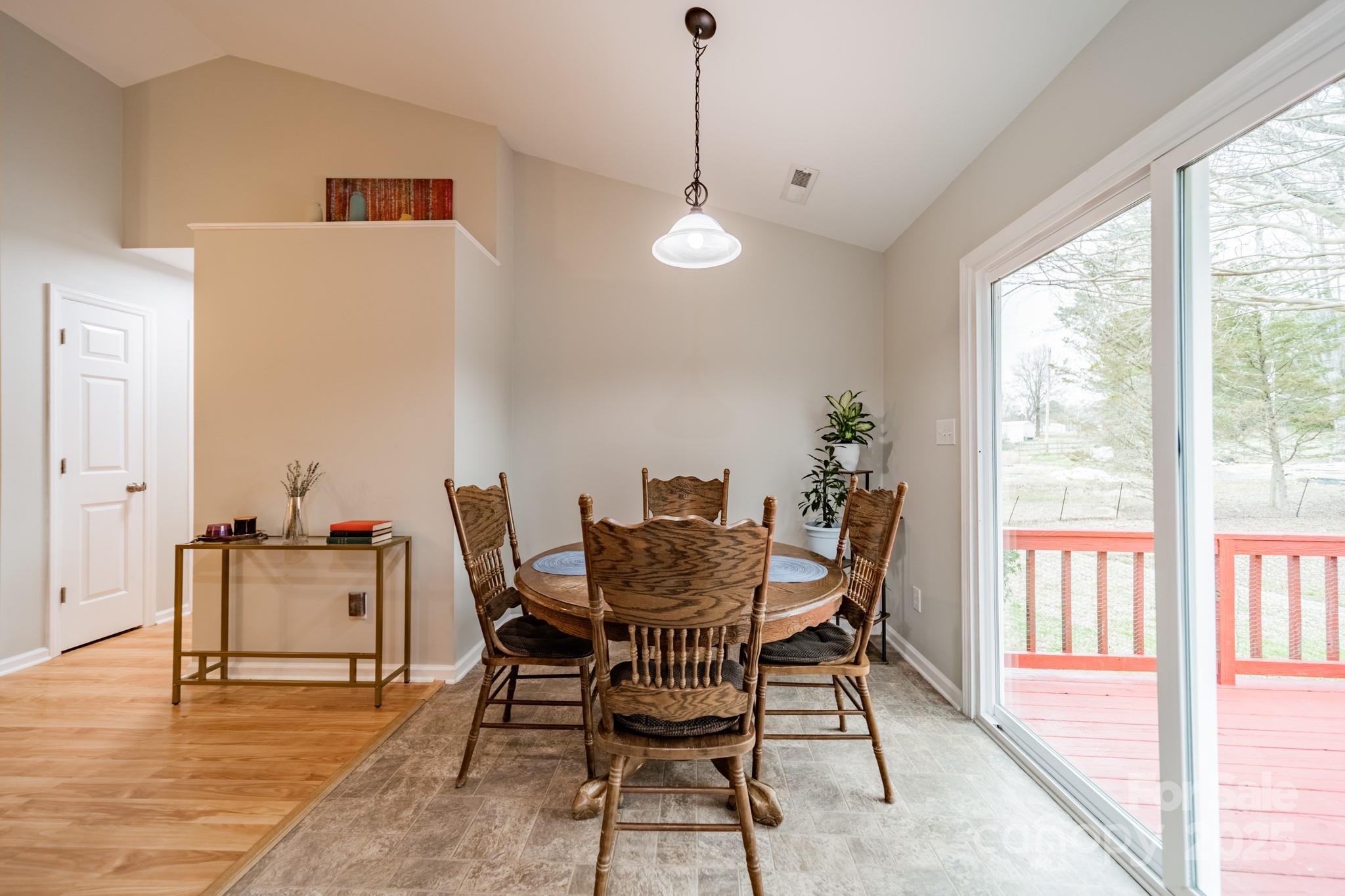 3414 Clearview Drive Monroe, NC 28110 - Photo 4 of 13 a view of a dining room with furniture window and wooden floor