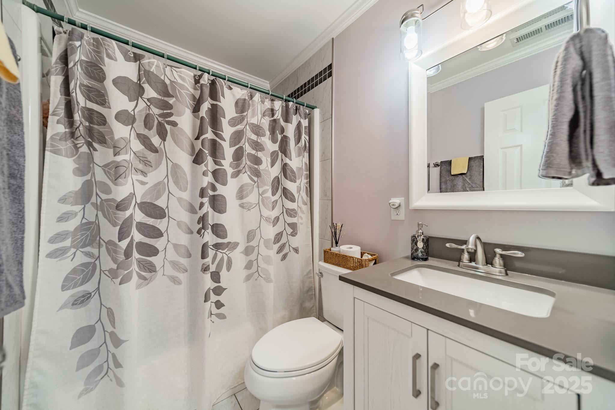 3414 Clearview Drive Monroe, NC 28110 - Photo 10 of 13 a bathroom with a sink toilet and shower