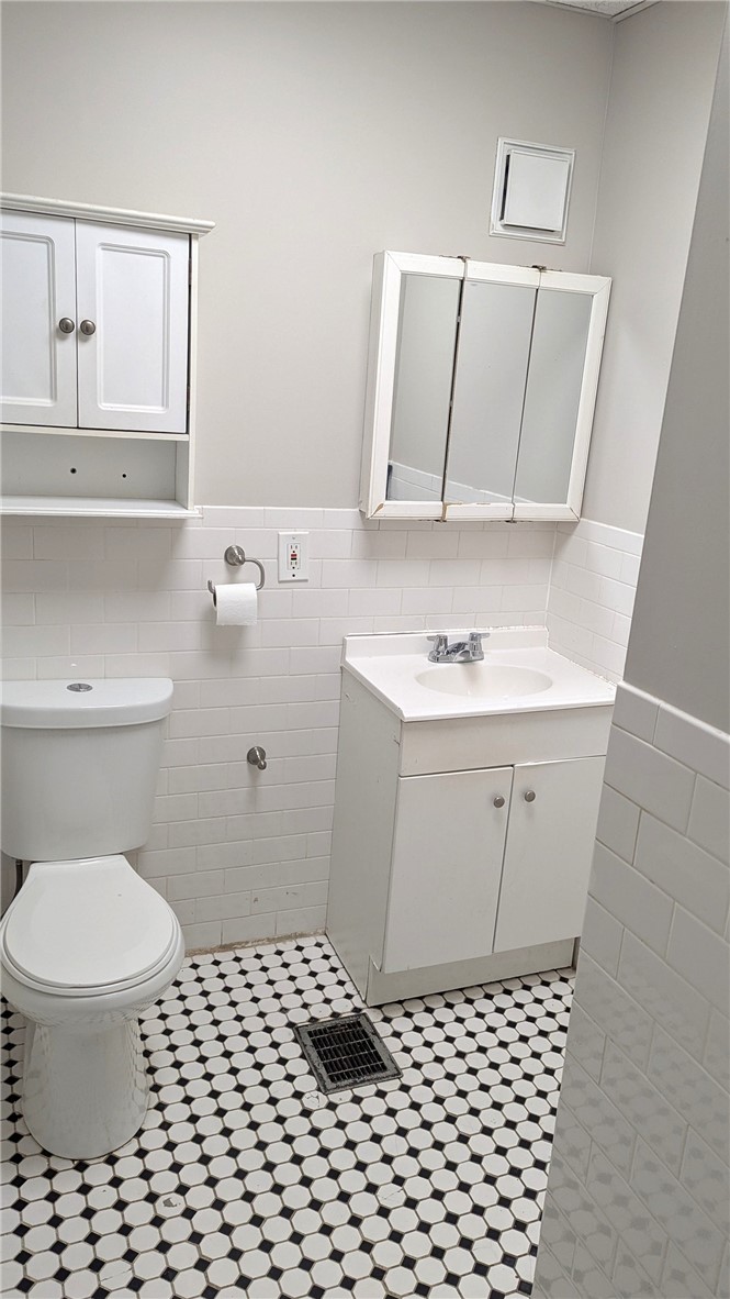502 Main Street Oneonta, NY 13820 - Photo 12 of 16 tile bathroom with tub/shower