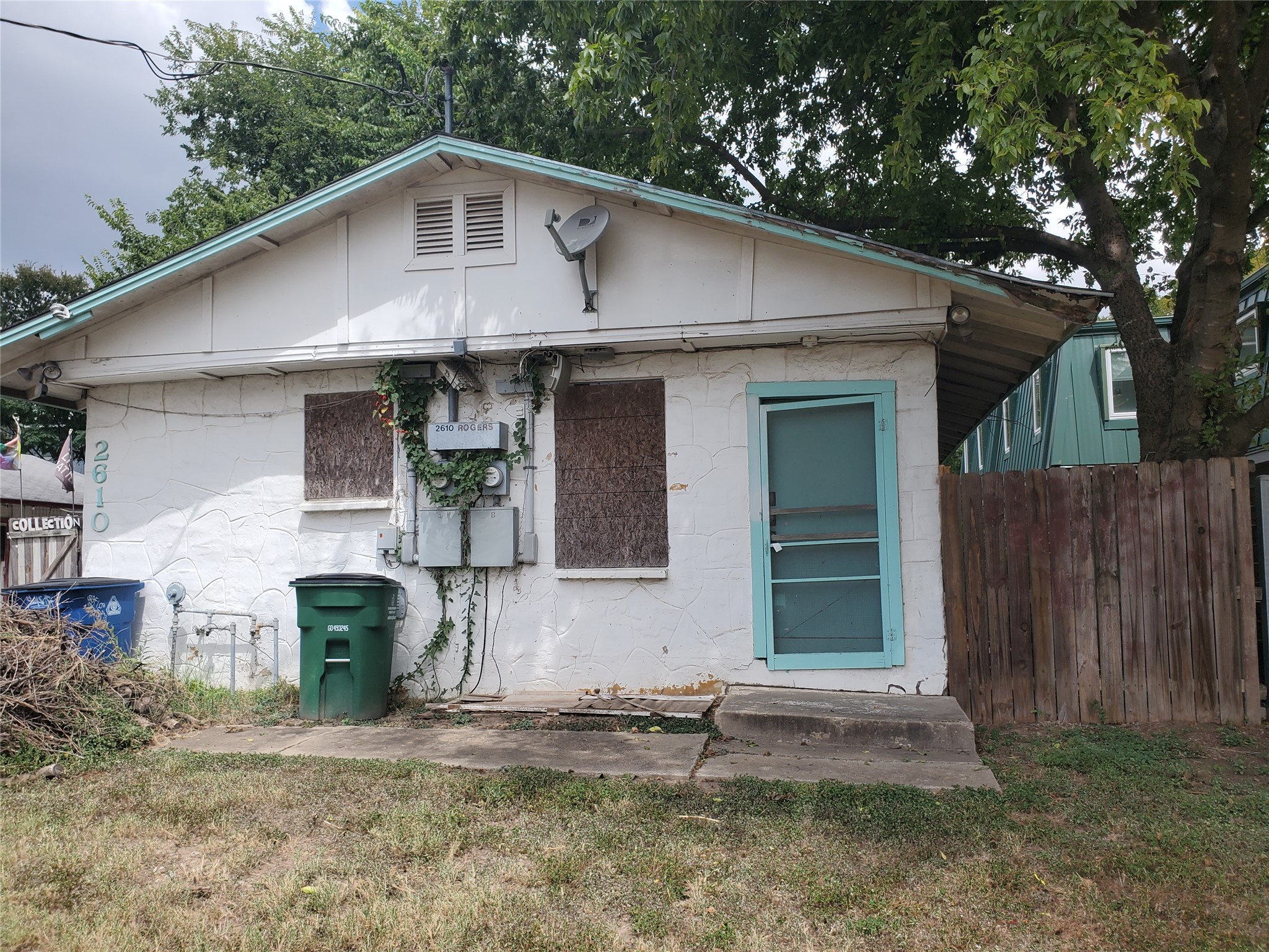 2610 Rogers Avenue Austin, TX 78722 - Photo 12 of 15 Back of property with concrete block siding