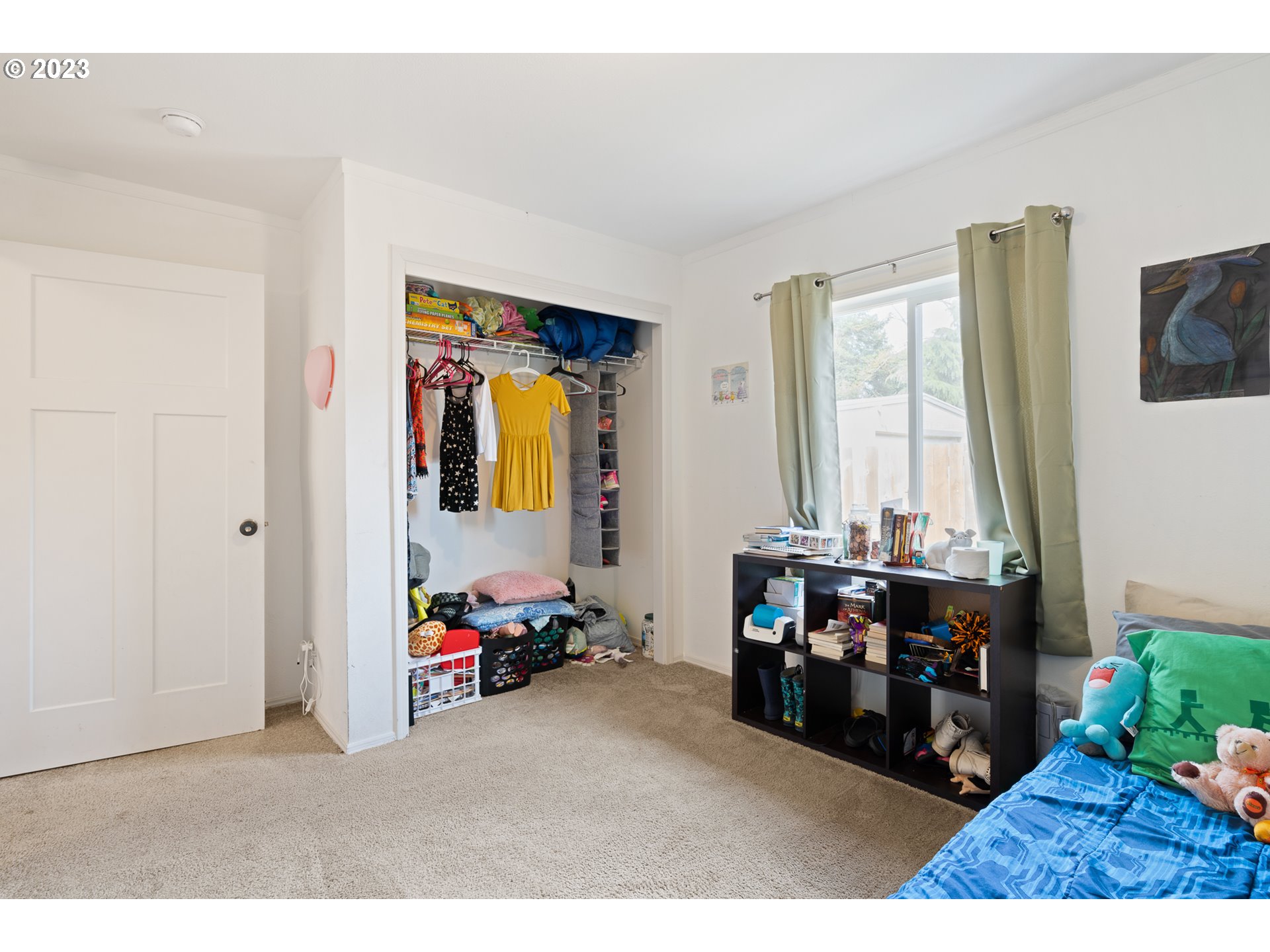 1383 Taney Street Eugene, OR 97402 - Photo 13 of 23 a living room with furniture and a flat screen tv