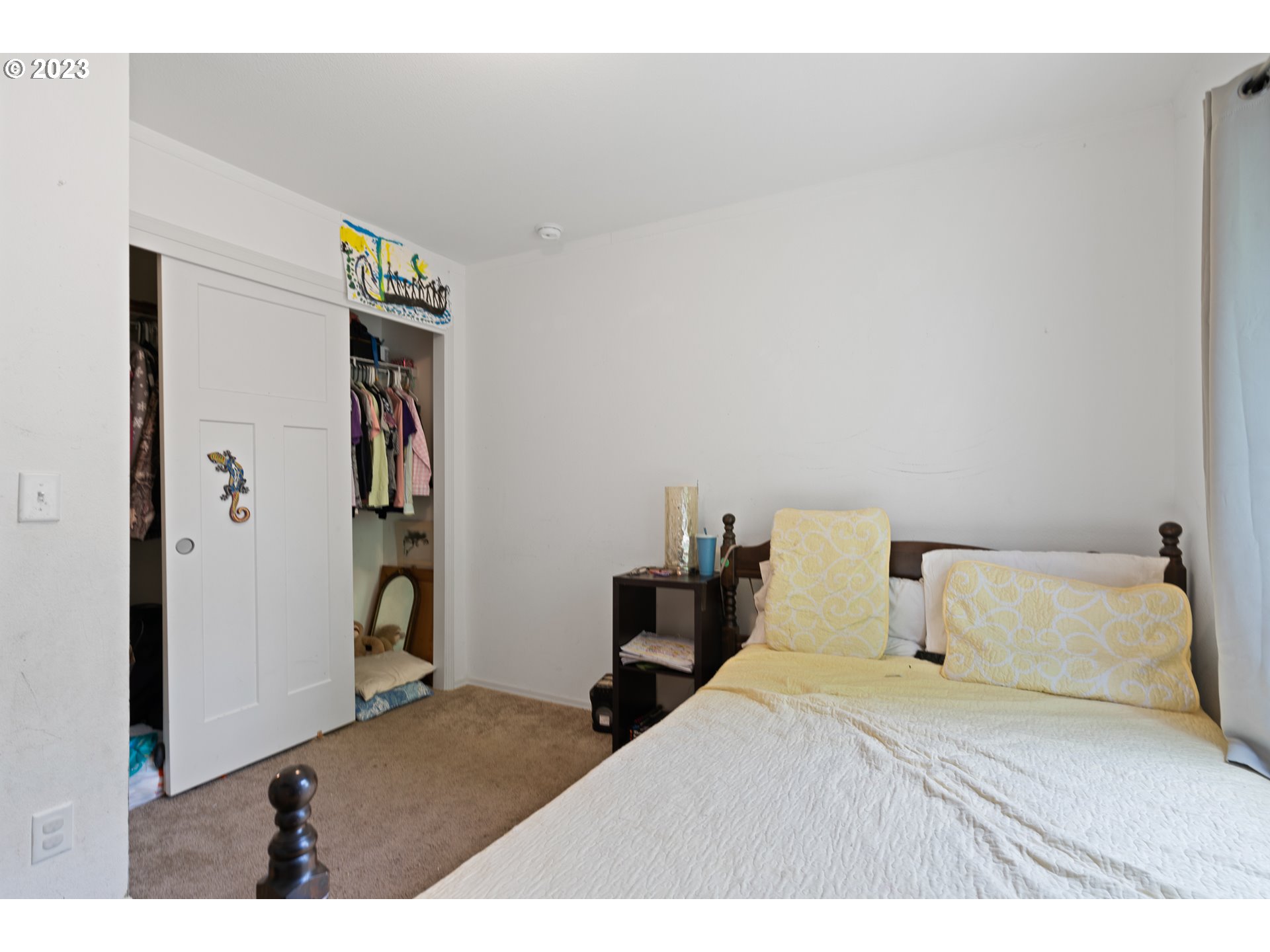 1383 Taney Street Eugene, OR 97402 - Photo 19 of 23 a bedroom with a bed and a cabinets