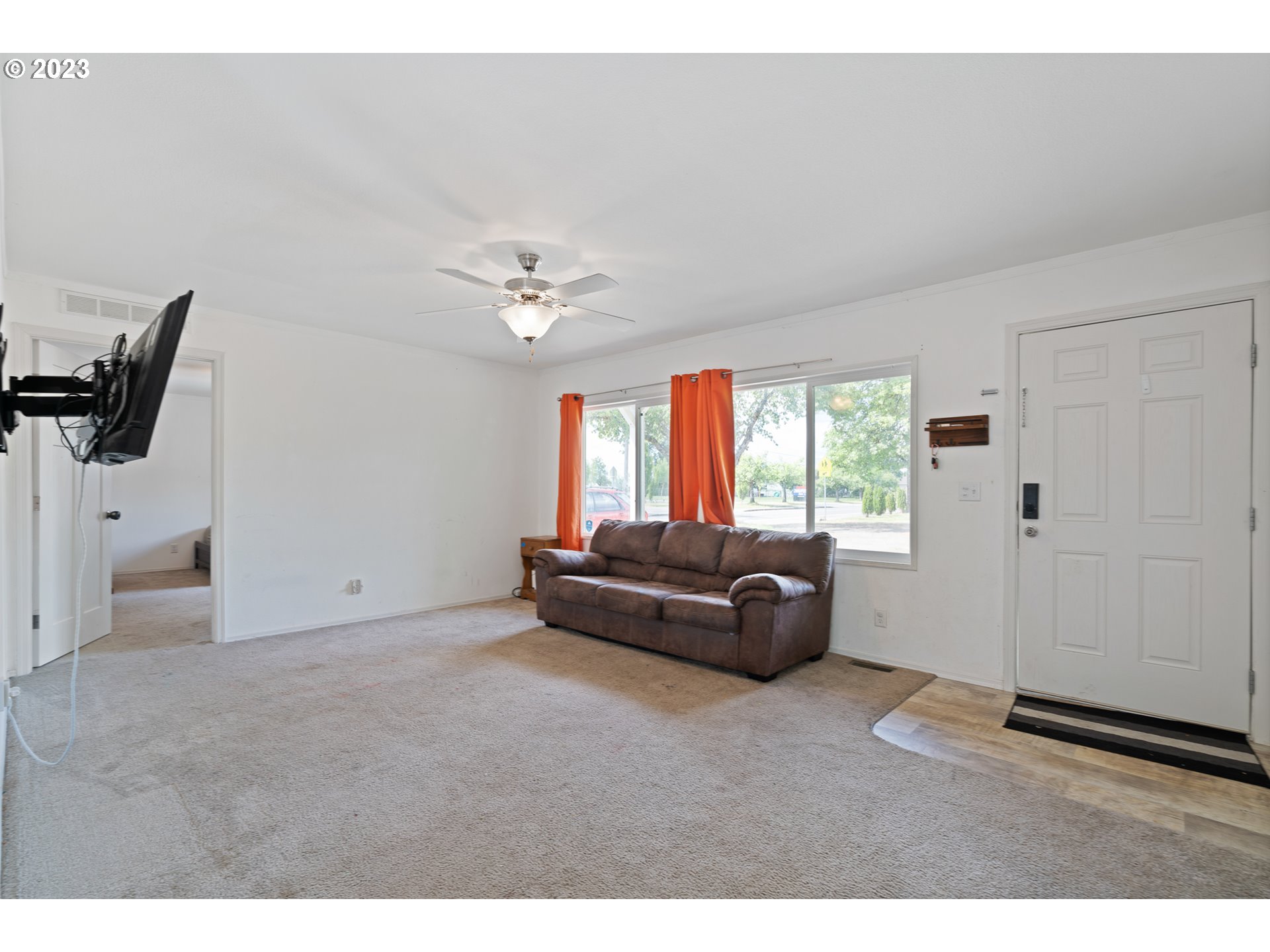 1383 Taney Street Eugene, OR 97402 - Photo 2 of 23 a living room with furniture and a window