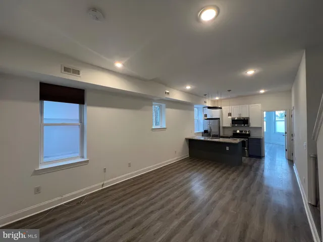 a view of kitchen and sink