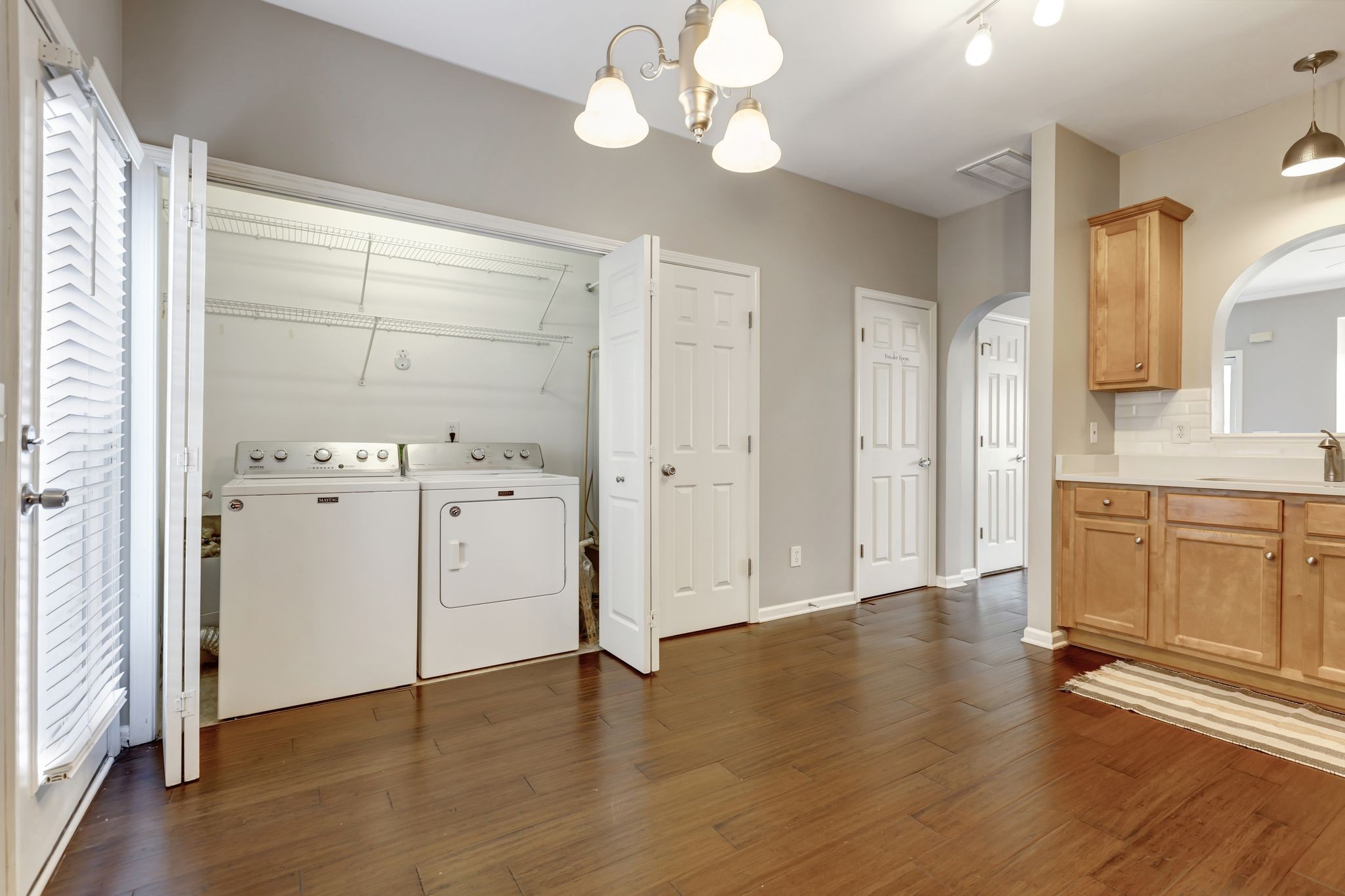 1101 Downs Boulevard, Unit 133 Franklin, TN 37064 - Photo 11 of 23 a view of a kitchen with wooden floor and a window