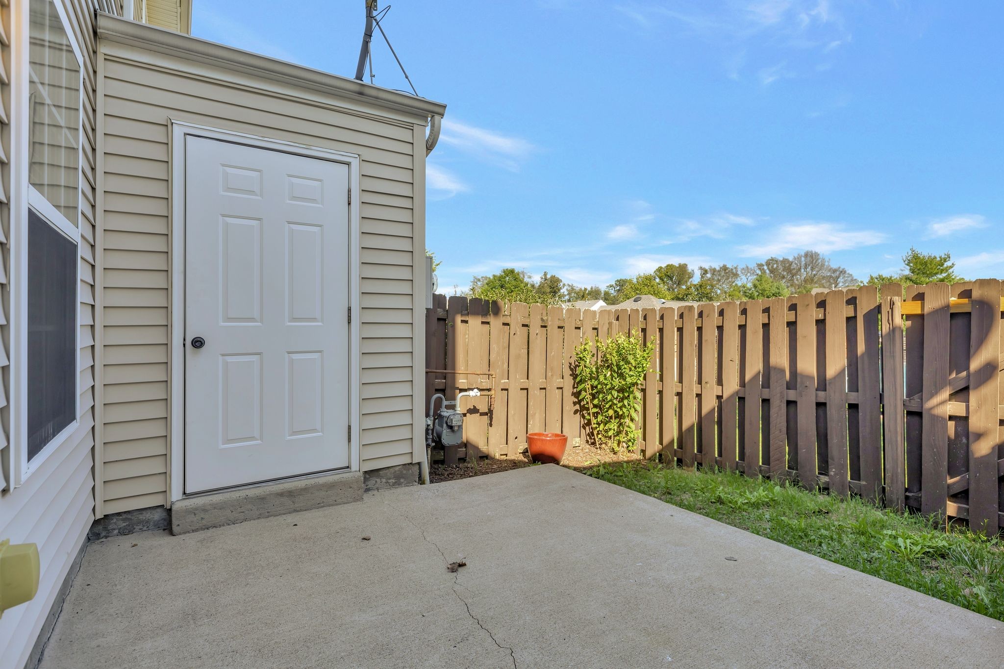 1101 Downs Boulevard, Unit 133 Franklin, TN 37064 - Photo 17 of 23 a house view with a backyard space