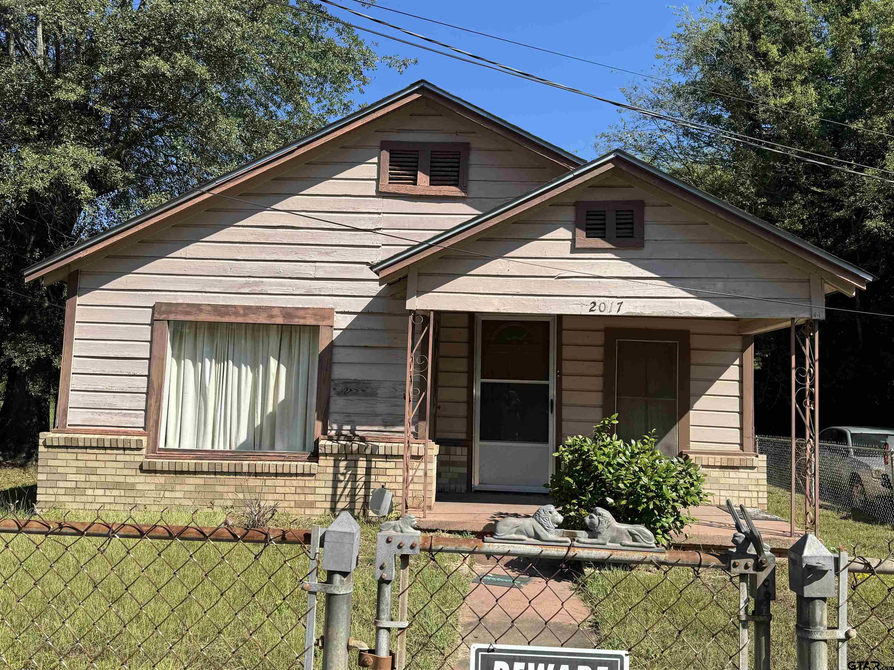 2017 West Jackson Street Tyler, TX 75701 - Photo 1 of 24 a front view of a house with garden