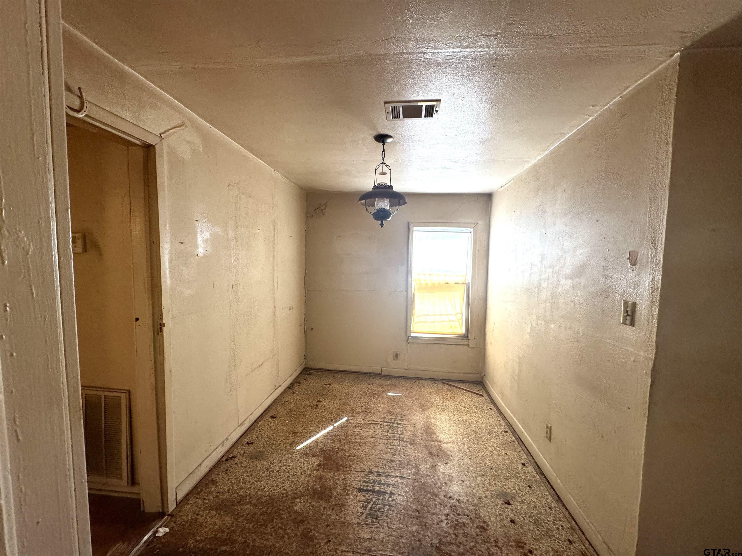 2017 West Jackson Street Tyler, TX 75701 - Photo 12 of 24 a view of hallway with a window