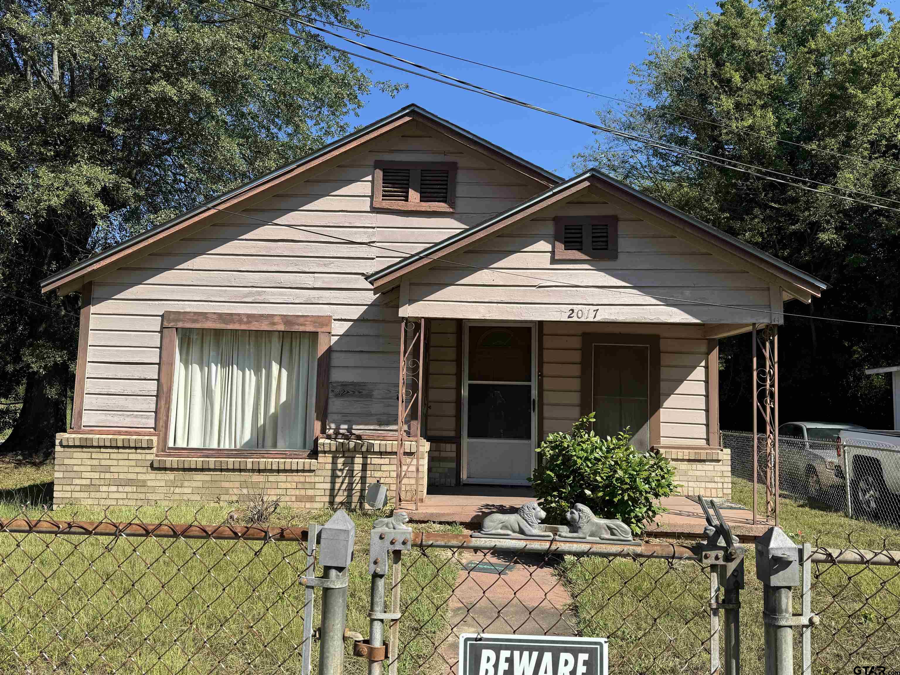 2017 West Jackson Street Tyler, TX 75701 - Photo 19 of 24 a front view of a house with garden