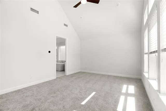 a kitchen with a sink a stove and a refrigerator