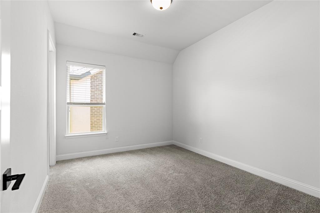 4405 Rosedale Street Prosper, TX 75078 - Photo 15 of 40 an empty room with a window