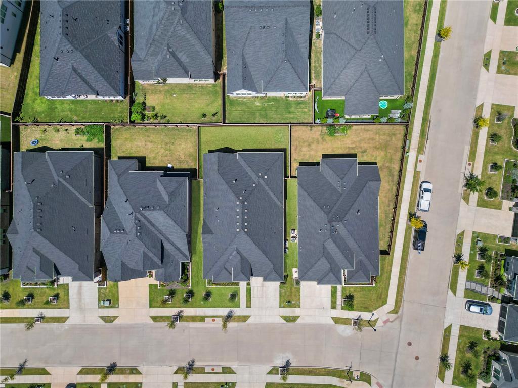 4405 Rosedale Street Prosper, TX 75078 - Photo 32 of 40 an aerial view of a houses with outdoor space
