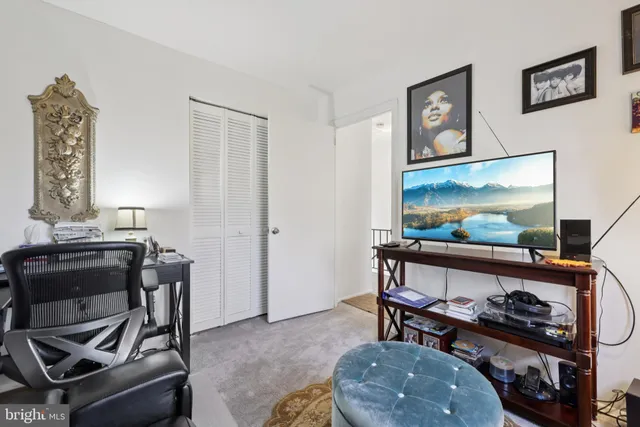 a room with a table and workspace