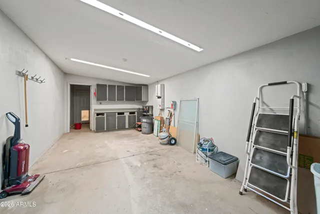 an aerial view of a house with a ocean view