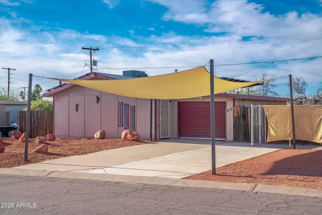 a front view of a house with a garage