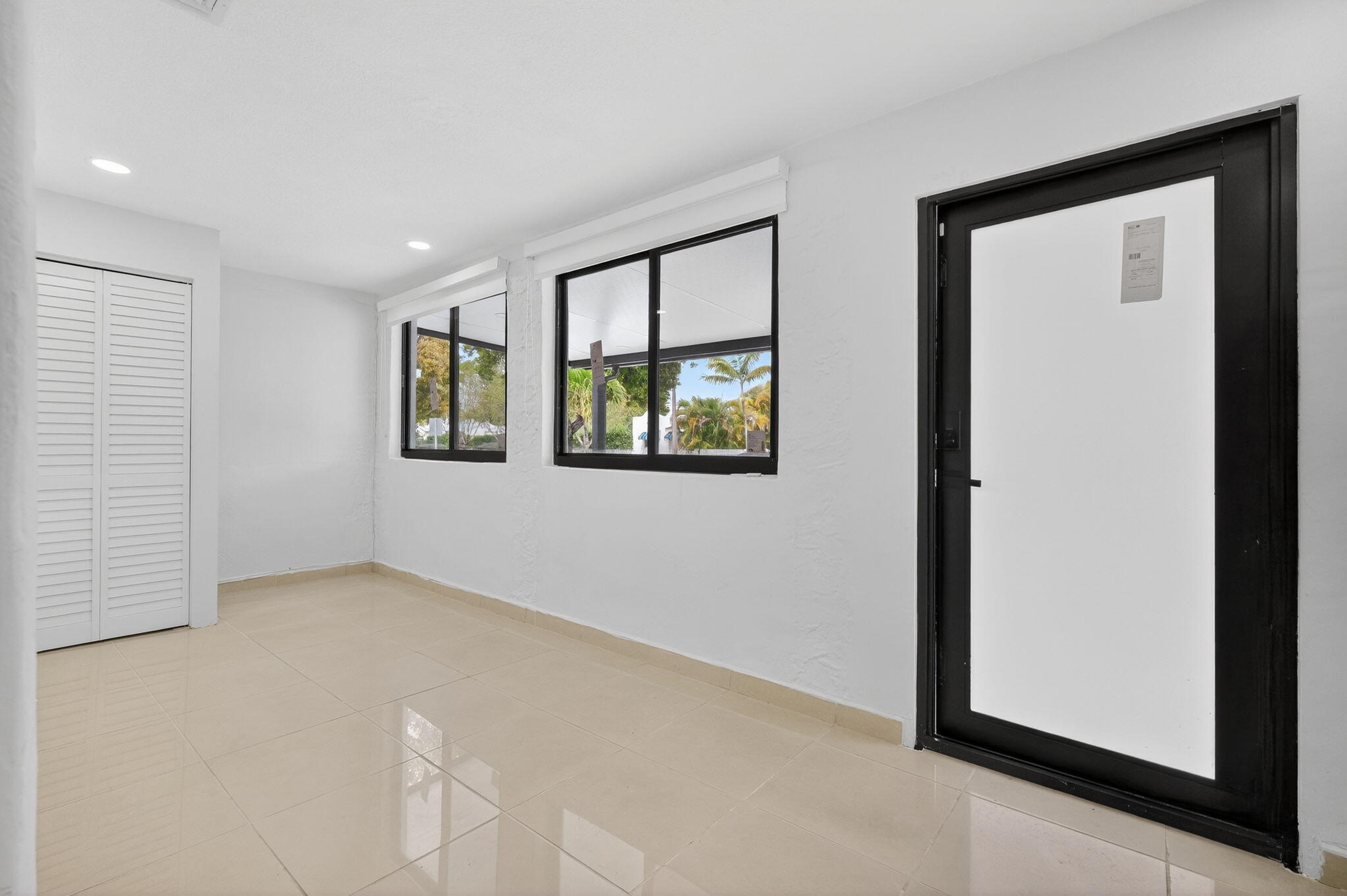2244 Southwest 10th Street Miami, FL 33135 - Photo 11 of 40 a view of an empty room with a window