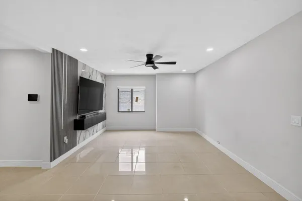 a view of a livingroom with a flat screen tv