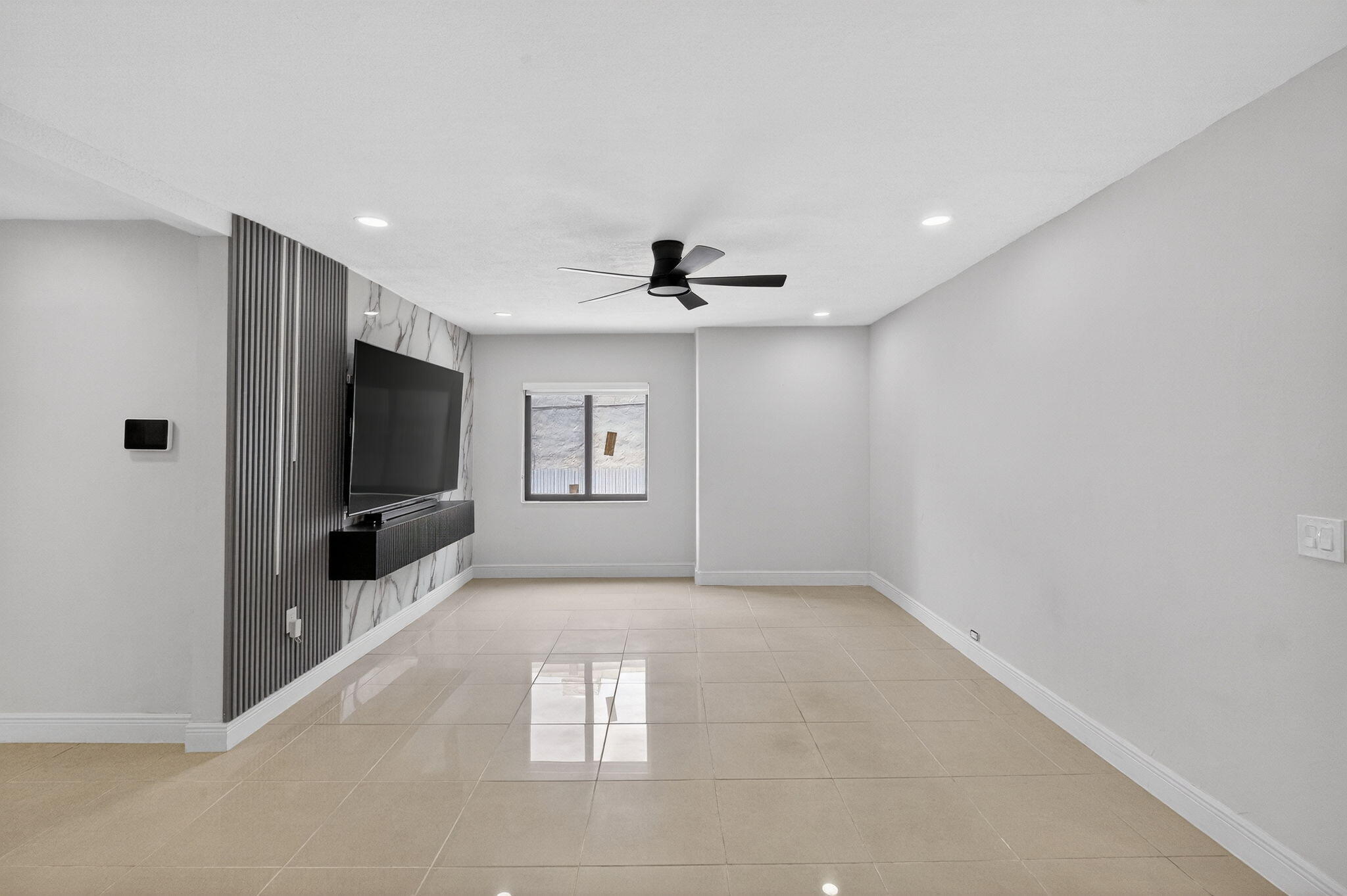 2244 Southwest 10th Street Miami, FL 33135 - Photo 14 of 40 a view of a livingroom with a flat screen tv