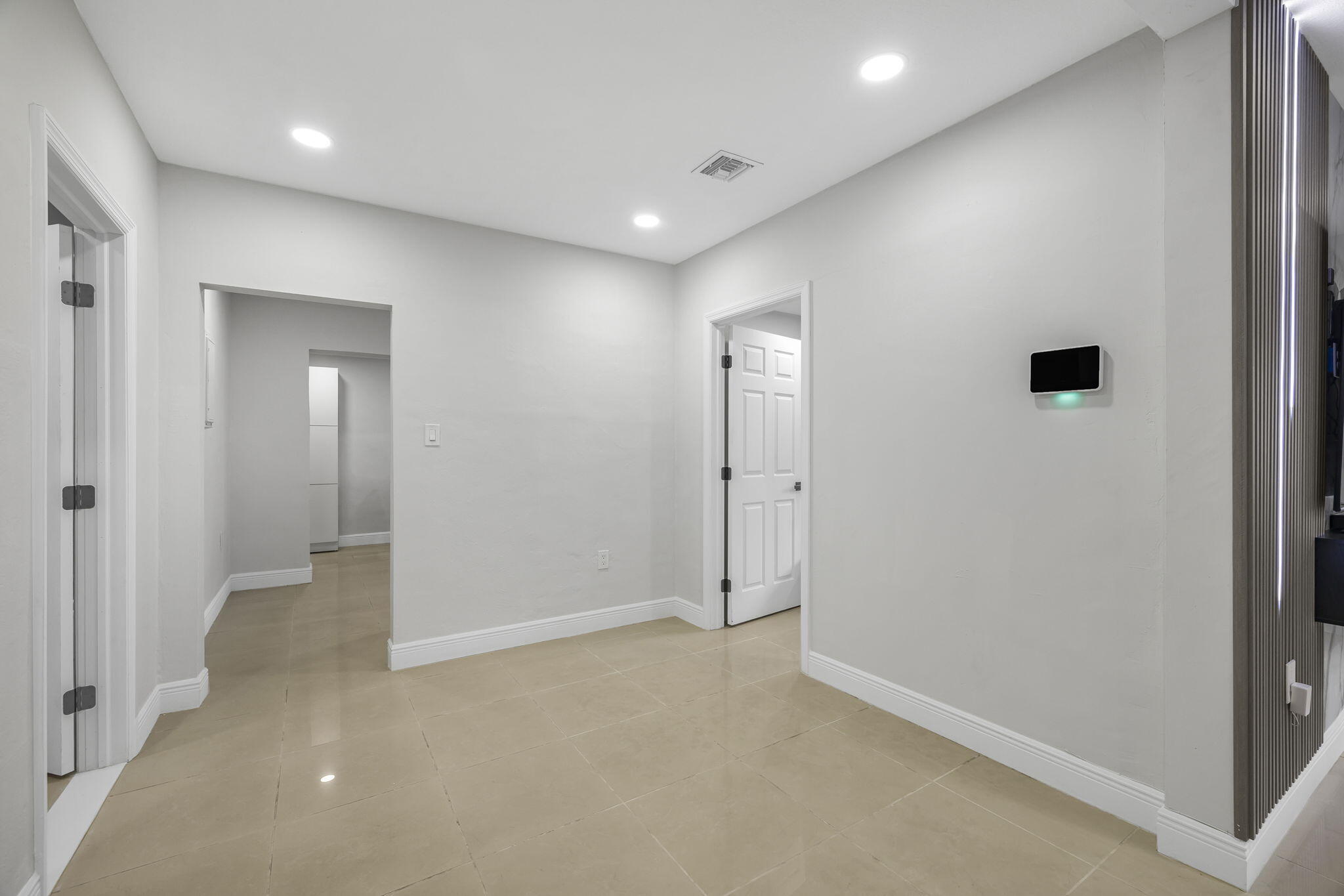 2244 Southwest 10th Street Miami, FL 33135 - Photo 19 of 40 an empty room with closet and mirror