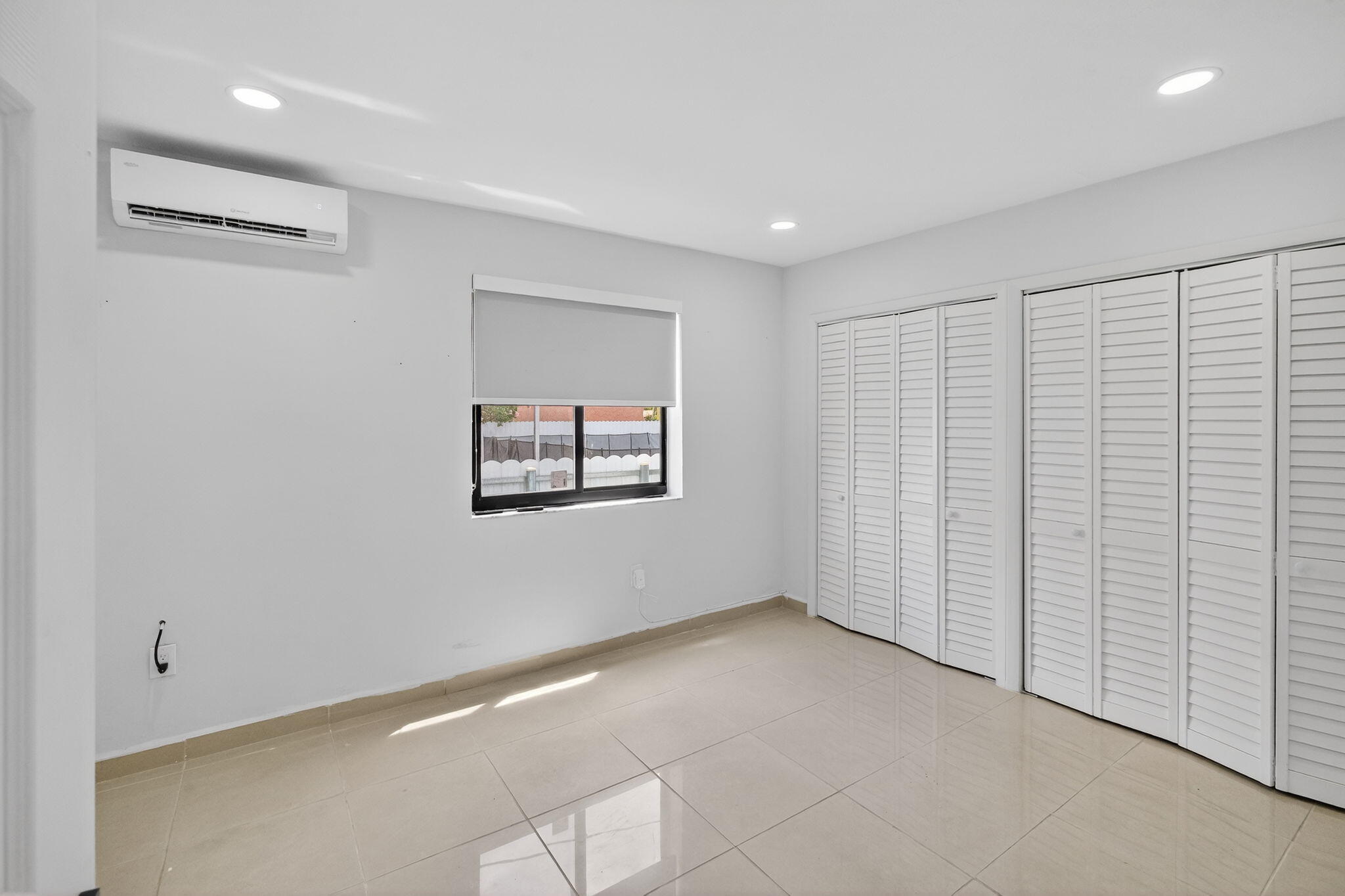 2244 Southwest 10th Street Miami, FL 33135 - Photo 24 of 40 a view of an empty room with a window