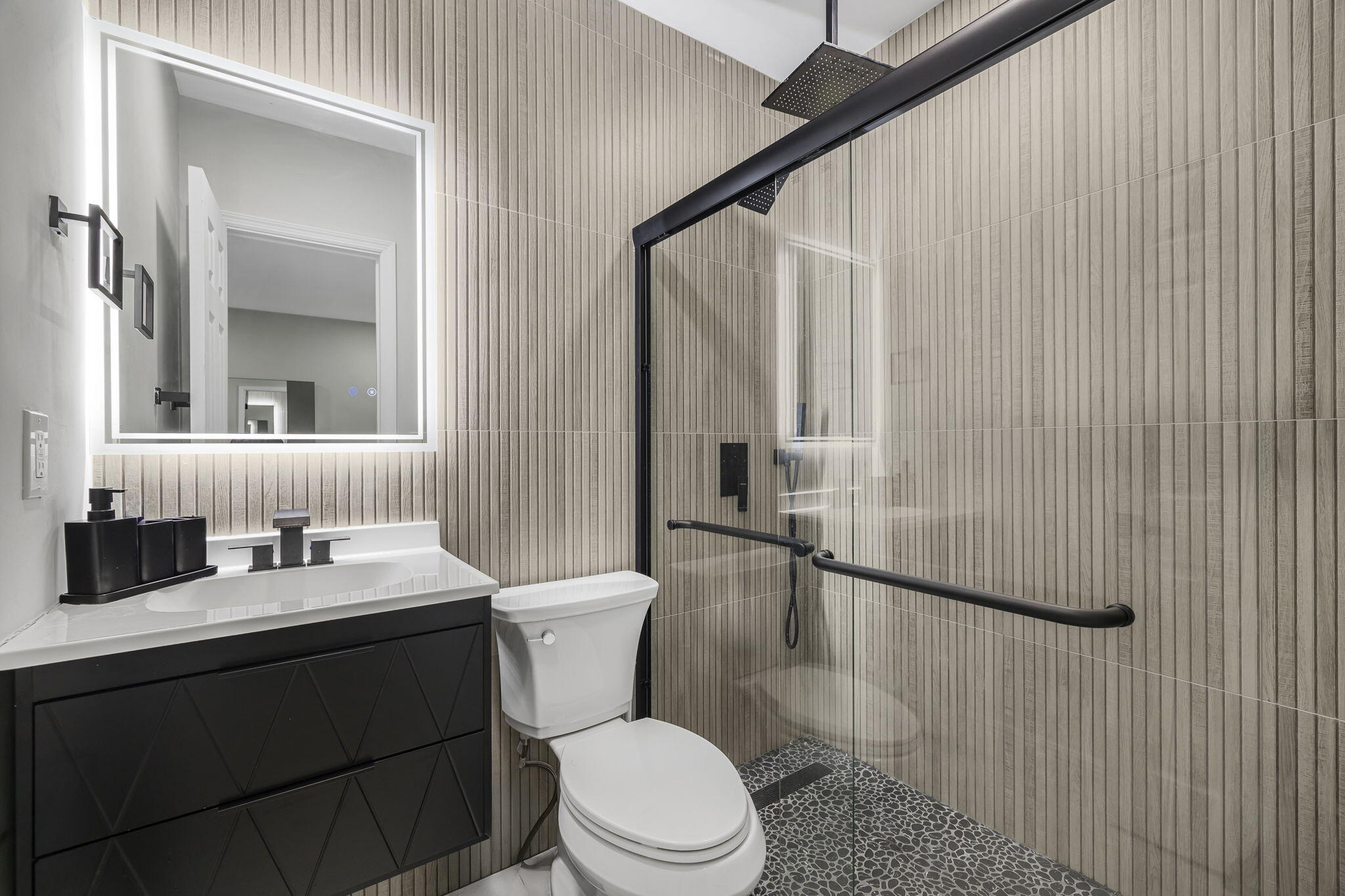 2244 Southwest 10th Street Miami, FL 33135 - Photo 27 of 40 a bathroom with a sink a toilet and shower