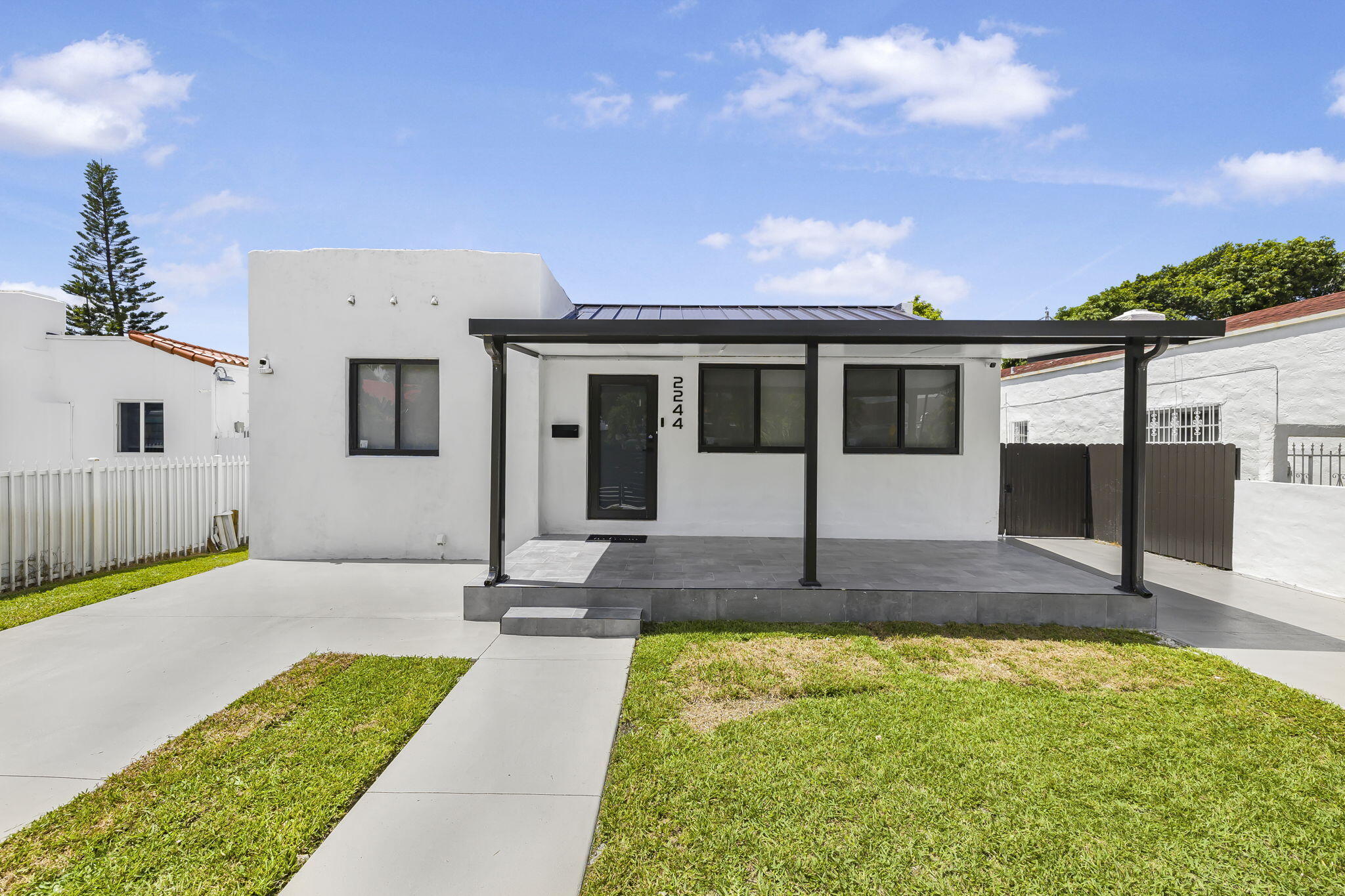 2244 Southwest 10th Street Miami, FL 33135 - Photo 5 of 40 a front view of house with yard