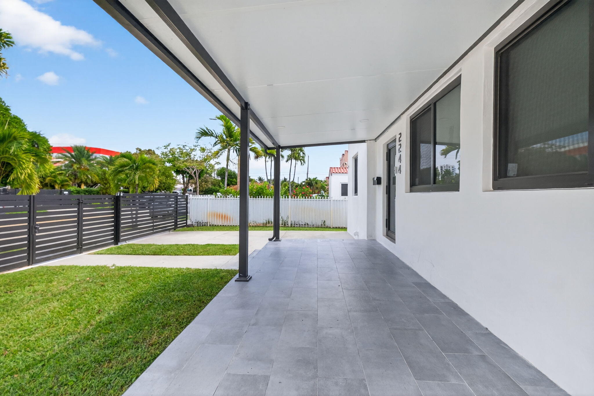 2244 Southwest 10th Street Miami, FL 33135 - Photo 10 of 40 a view of a house with backyard and a fence