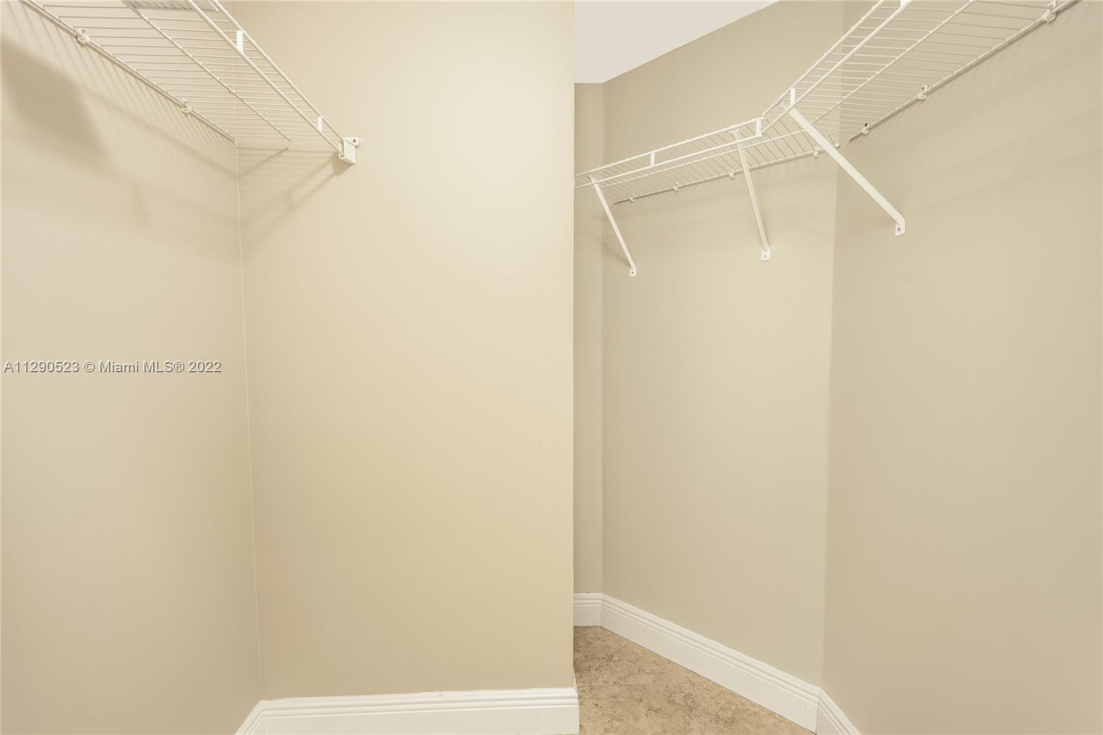9172 Collins Avenue, Unit 403 Surfside, FL 33154 - Photo 18 of 30 a bathroom with a shower