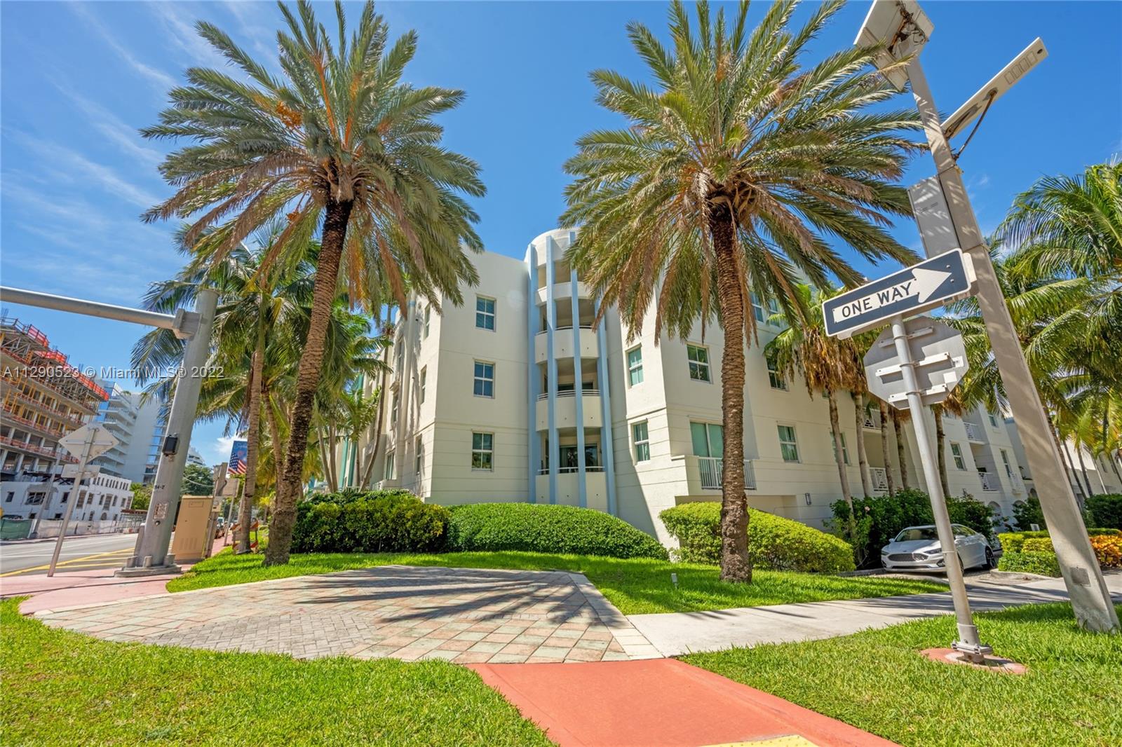 9172 Collins Avenue, Unit 403 Surfside, FL 33154 - Photo 3 of 30 a view of a palm trees in front of a building