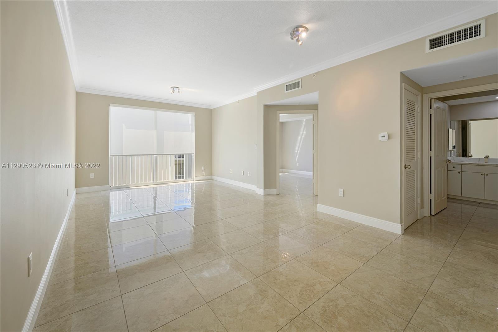 9172 Collins Avenue, Unit 403 Surfside, FL 33154 - Photo 6 of 30 a view of livingroom with the kitchen