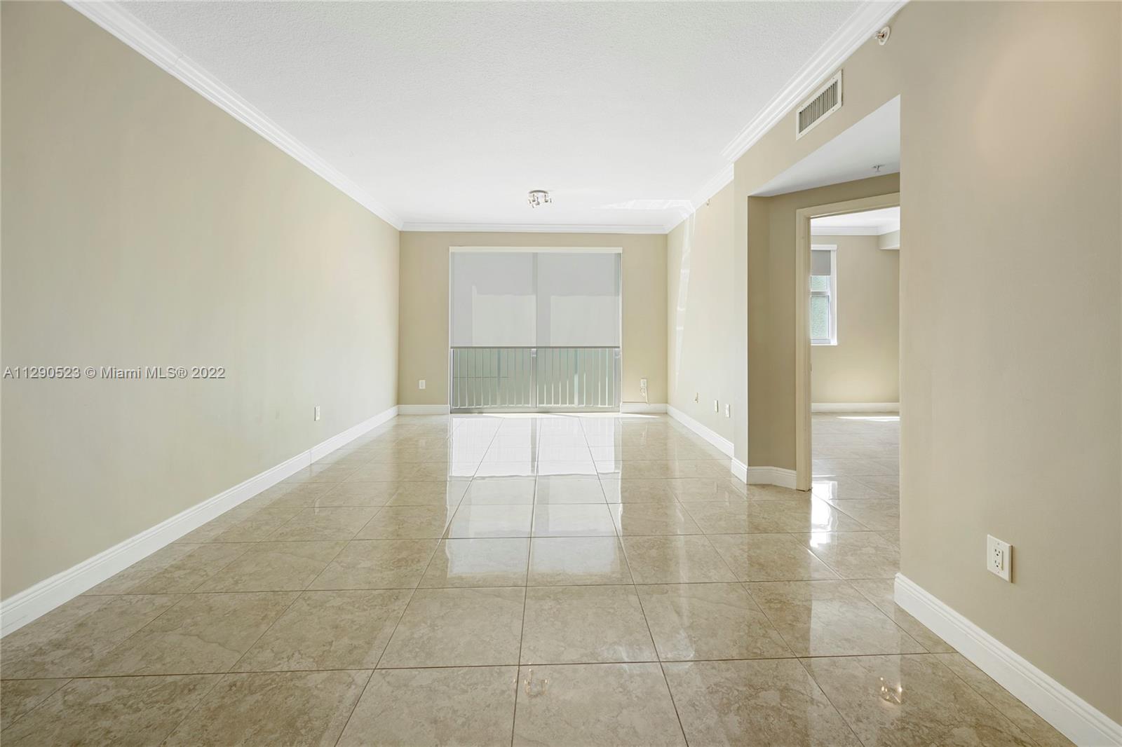 9172 Collins Avenue, Unit 403 Surfside, FL 33154 - Photo 9 of 30 a view of an empty room and window
